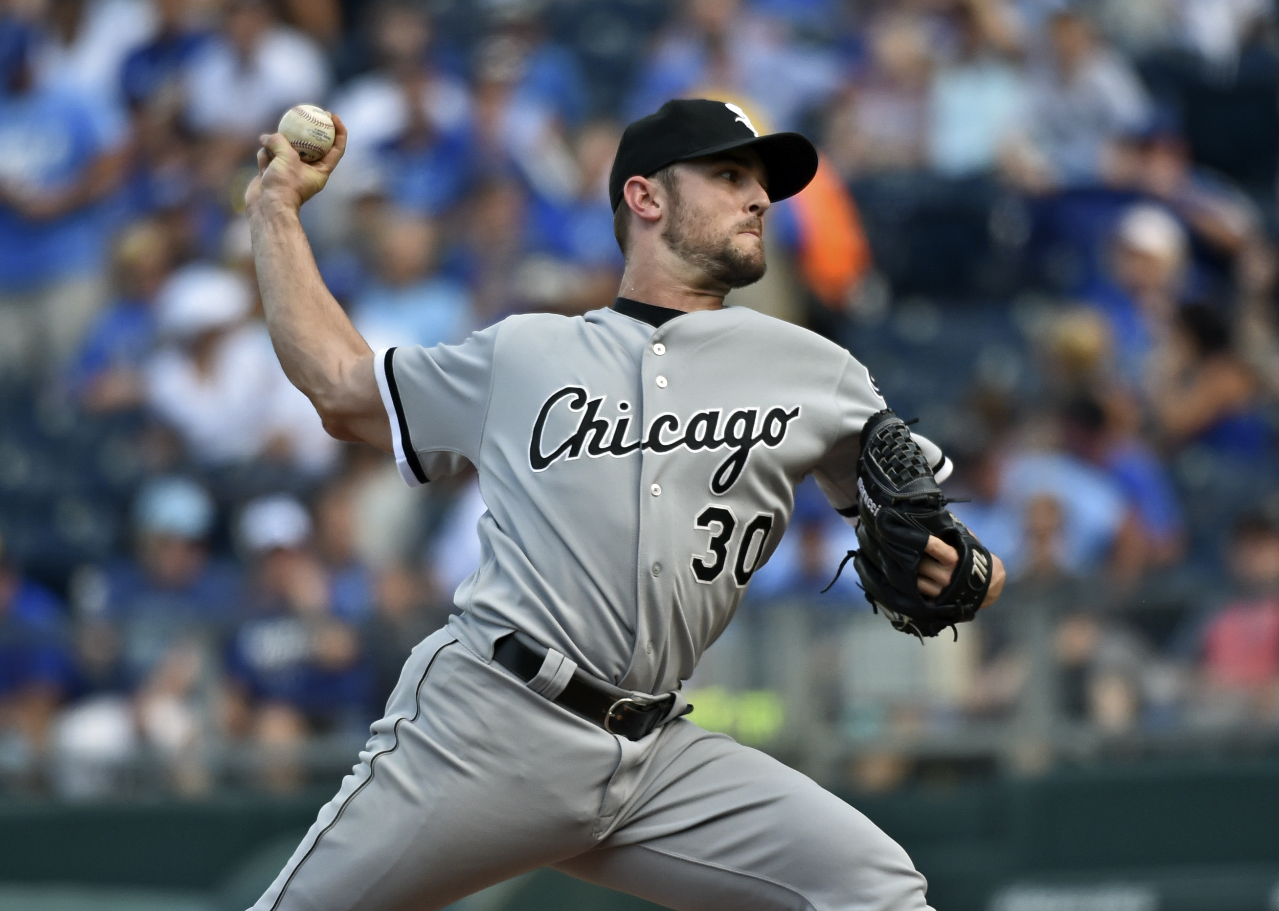 Sep 6, 2015; Kansas City, MO, USA; Chicago White Sox pitcher David Robertson (30) delivers a pitch against the Kansas City Royals during the ninth inning at Kauffman Stadium. Mandatory Credit: Peter G. Aiken-USA TODAY Sports